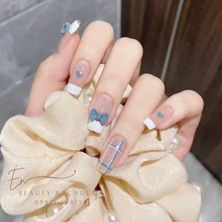 this is a picture of a manicure with nail extensions