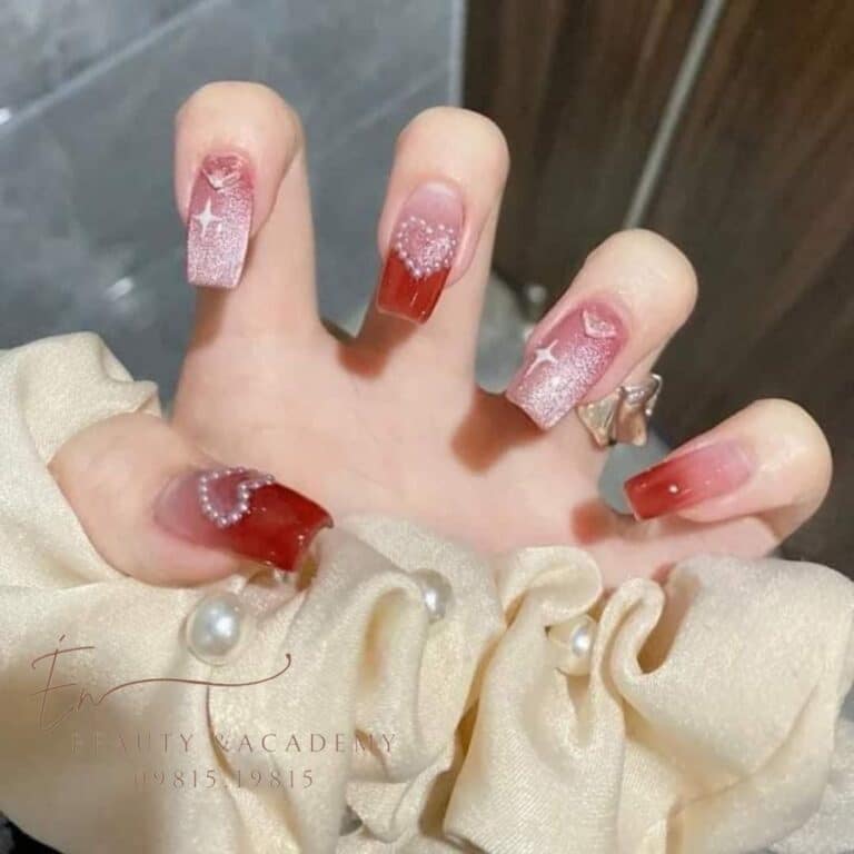 this is a photo of a manicure with nail extensions